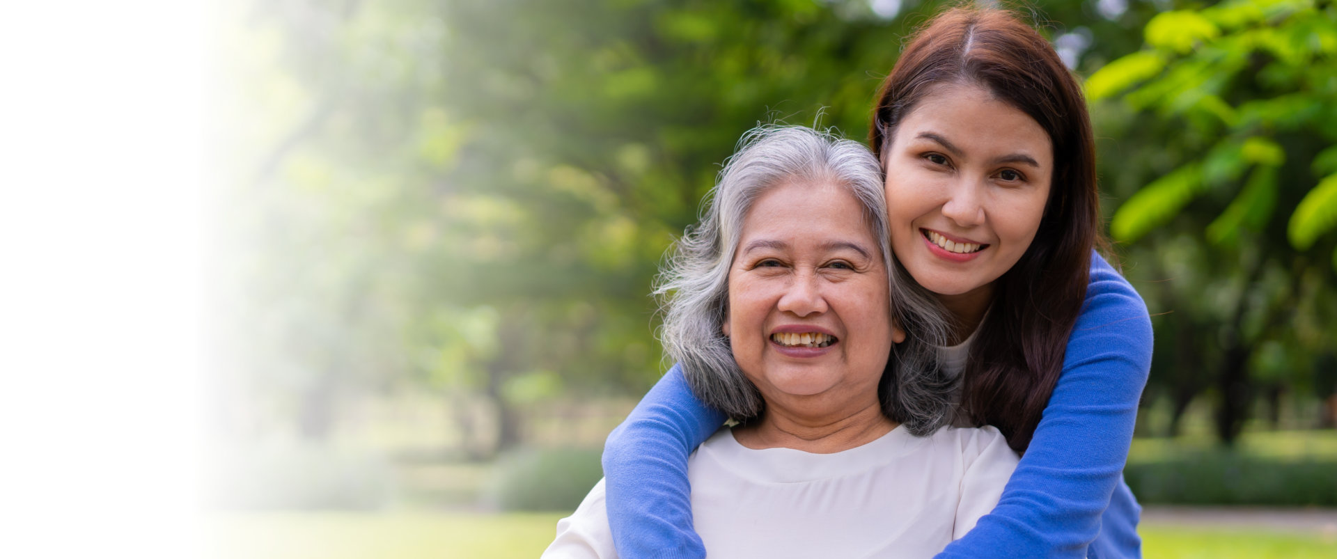 Caregiver Hugging elderly