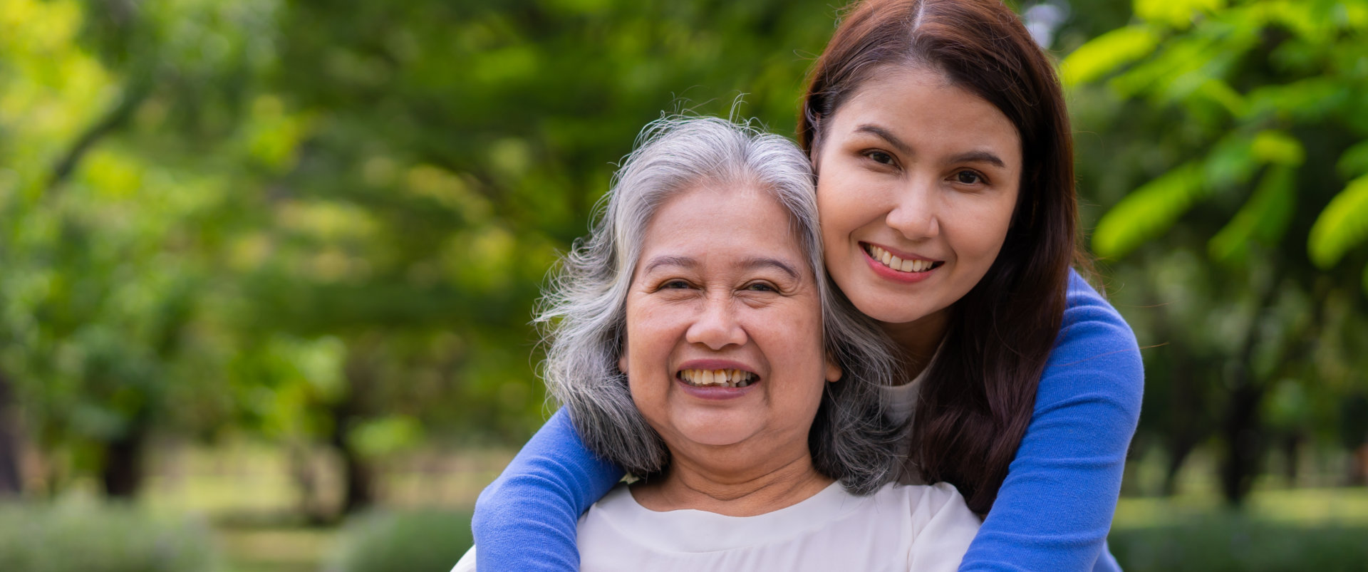 Caregiver Hugging elderly